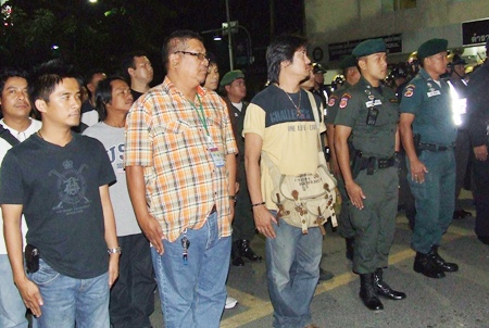 Police and volunteers prepare to head out to Walking Street to make sure all entertainment venues adhere to the new agreement.
